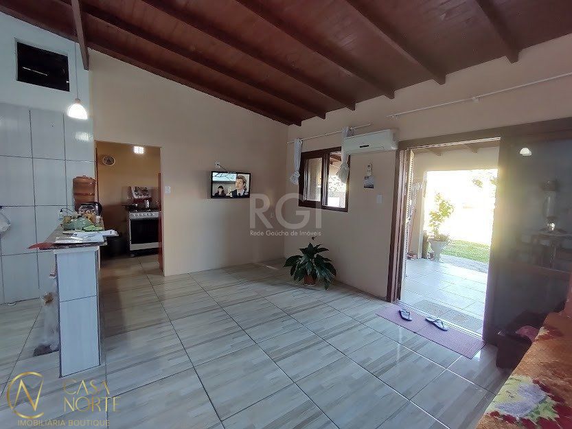 Casa à venda com 2 quartos, 156m², 3 vagas, Rua dos Biazetto no bairro Campo Novo em Porto Alegre