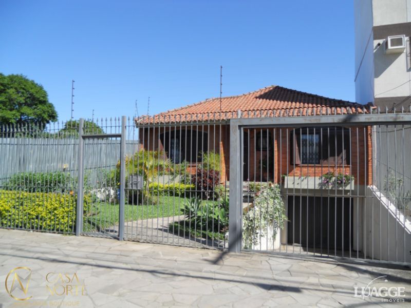 Casa à venda com 3 quartos, 283m², 1 suíte, 4 vagas, Rua Correa Lima no bairro Santa Tereza em Porto Alegre
