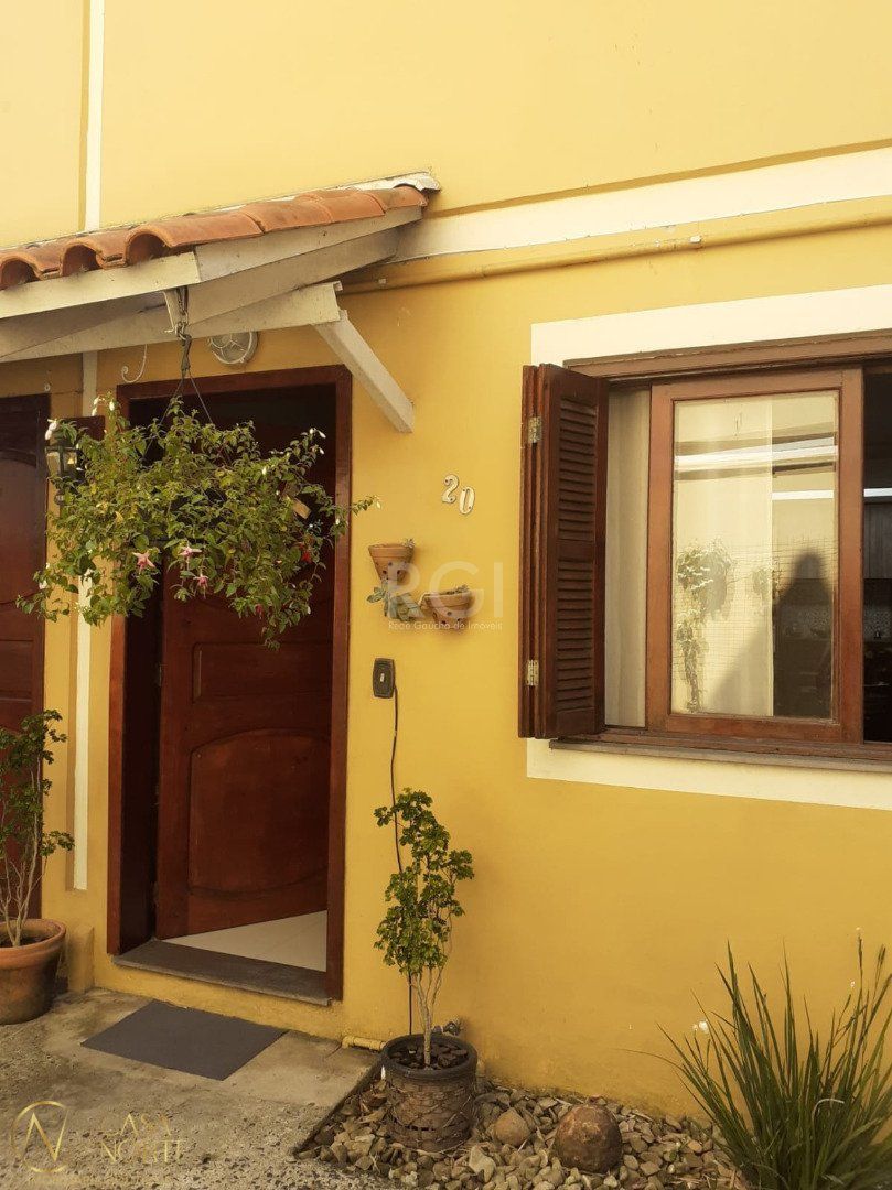 Casa de Condomínio à venda com 3 quartos, 56m², 1 vaga, Estrada Campo Novo no bairro Aberta dos Morros em Porto Alegre