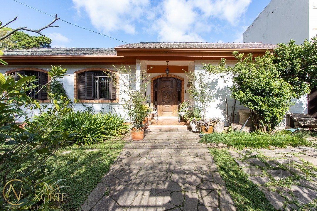 Casa à venda com 4 quartos, 162m², 1 suíte, 3 vagas, Rua Correa Lima no bairro Santa Tereza em Porto Alegre