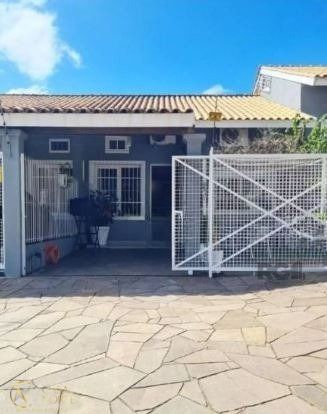 Casa à venda com 2 quartos, 80m², 2 vagas, Rua Professora Ziláh Totta no bairro Jardim Leopoldina em Porto Alegre