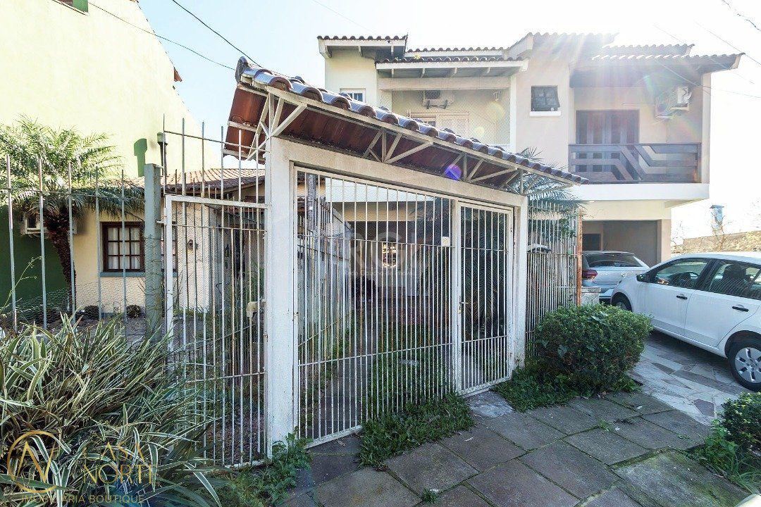 Casa à venda com 2 quartos, 112m², 1 suíte, 2 vagas, Rua Michael Motta Seelig no bairro Hípica em Porto Alegre