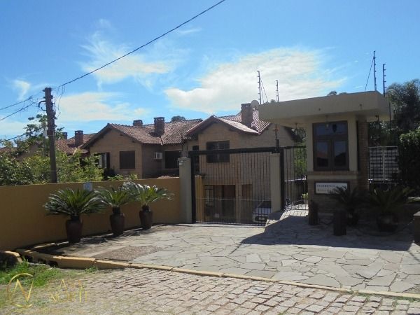 Casa de Condomínio à venda com 3 quartos, 121m², 1 suíte, 2 vagas, Rua Hubert Otto Krause no bairro Aberta dos Morros em Porto Alegre