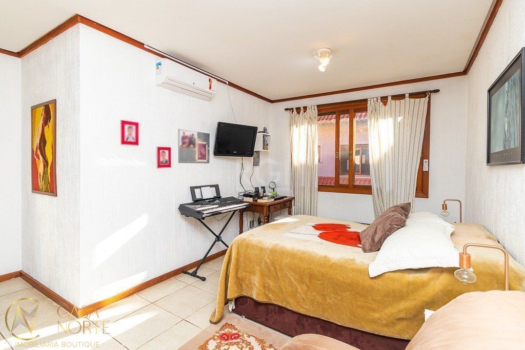 Casa de Condomínio à venda com 3 quartos, 239m², Rua Gilberto Laste no bairro Santa Tereza em Porto Alegre