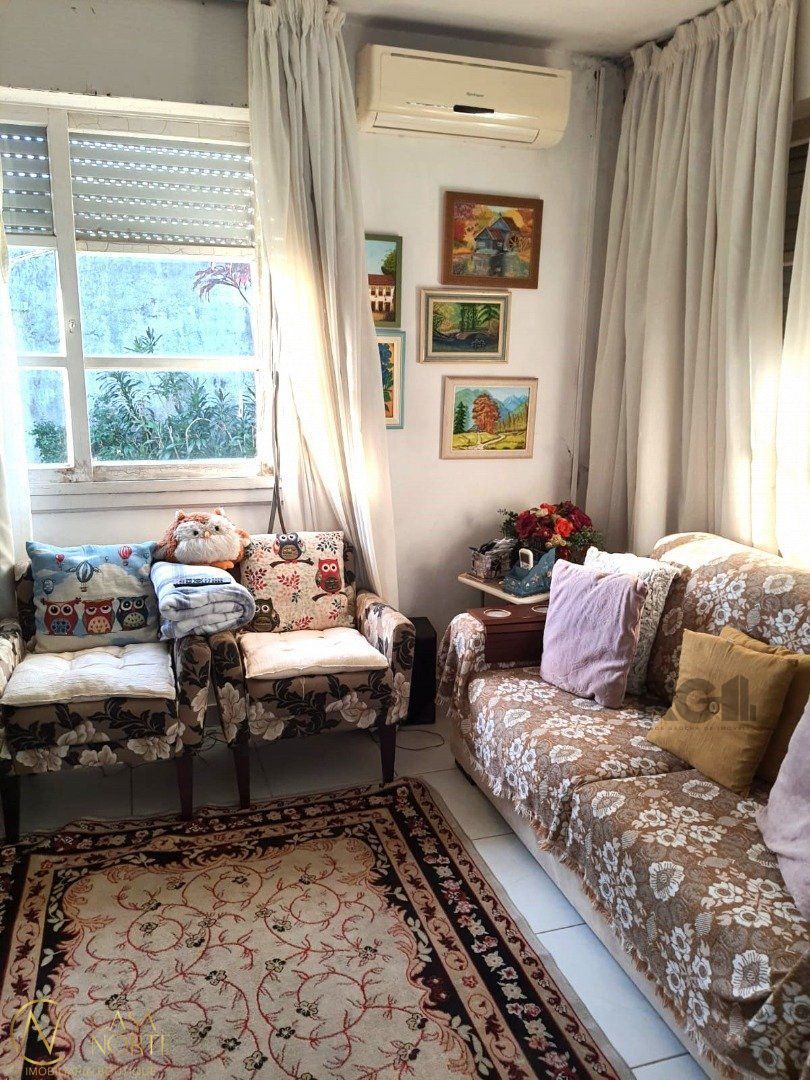 Casa à venda com 3 quartos, 148m², 4 vagas, Rua Rubens Alcantara no bairro Santa Tereza em Porto Alegre