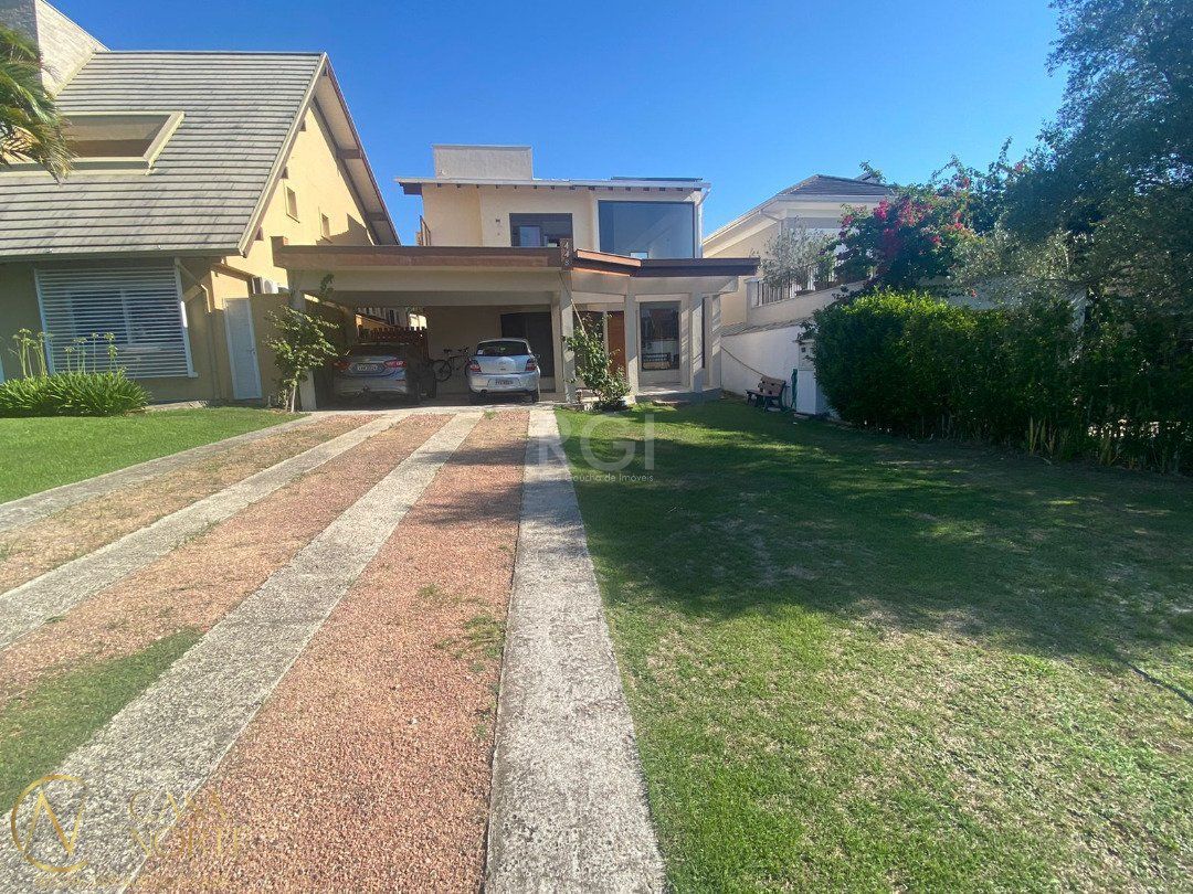 Casa de Condomínio à venda com 3 quartos, 300m², 3 suítes, 4 vagas, Avenida Juca Batista no bairro Belém Novo em Porto Alegre