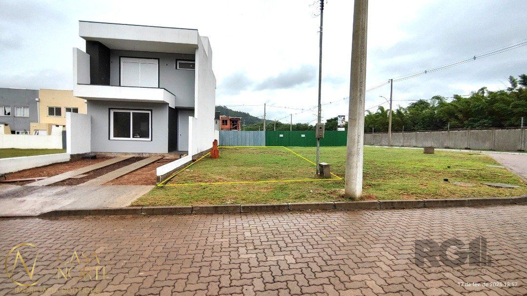 Terreno à venda  com 122m², Estrada Jorge Pereira Nunes no bairro Campo Novo em Porto Alegre
