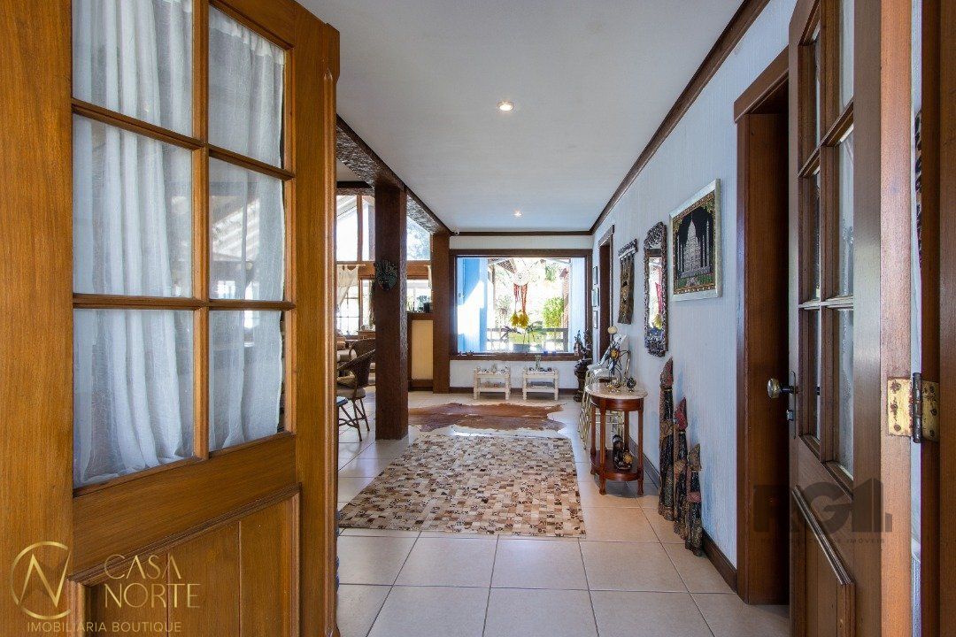 Casa de Condomínio à venda com 3 quartos, 250m², 3 suítes, 4 vagas, Avenida Juca Batista no bairro Belém Novo em Porto Alegre