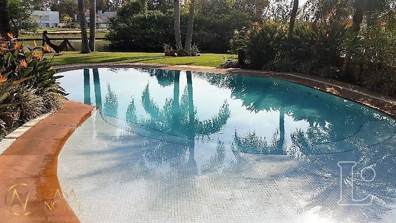 Casa de Condomínio à venda com 3 quartos, 341m², 3 suítes, 2 vagas, Avenida Juca Batista no bairro Belém Novo em Porto Alegre