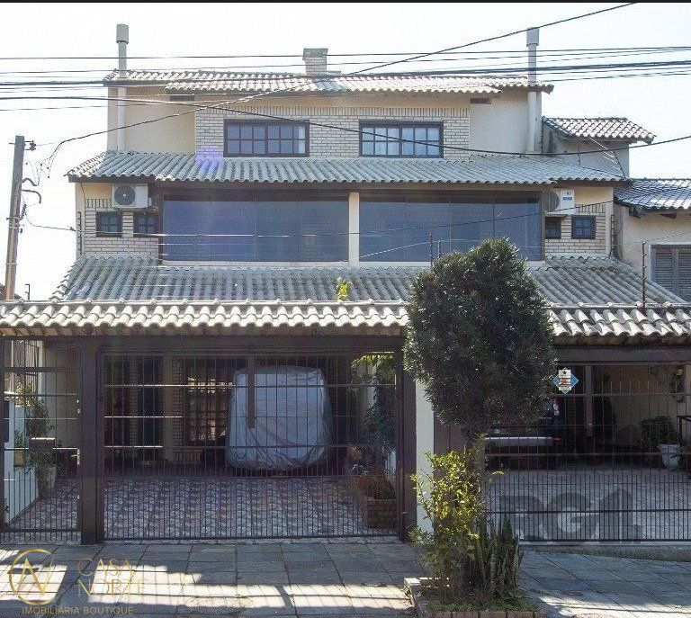 Casa à venda com 3 quartos, 202m², 1 suíte, 2 vagas, Rua Doutor Egydio Michaelsen no bairro Cavalhada em Porto Alegre