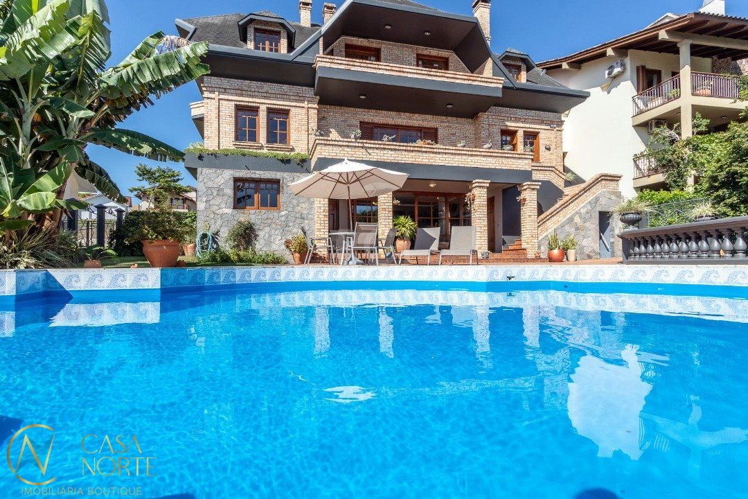 Casa de Condomínio à venda com 4 quartos, 559m², 3 suítes, 3 vagas, Avenida Firmino Octavio Bimbi no bairro Cavalhada em Porto Alegre