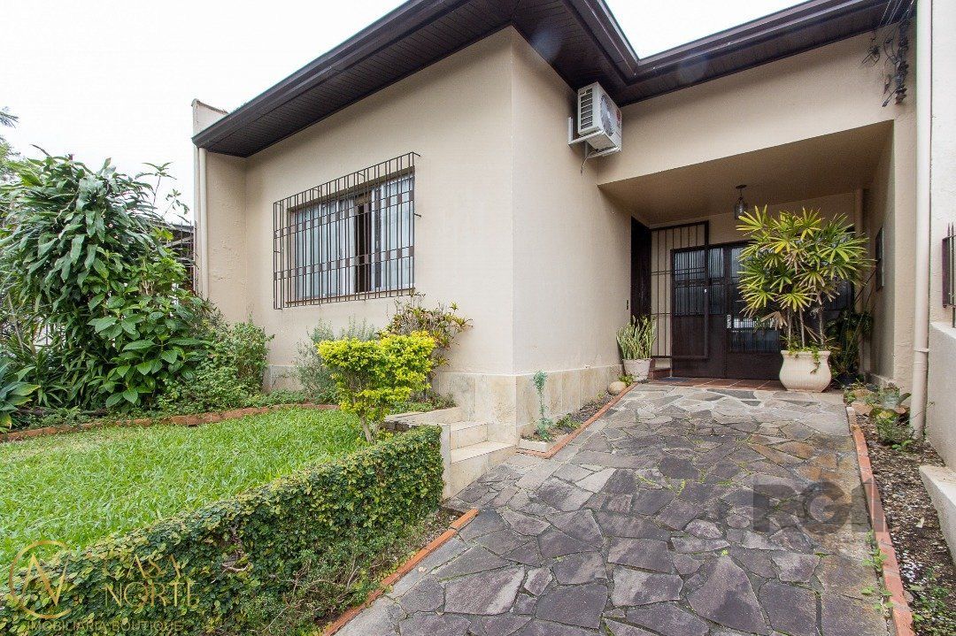 Casa à venda com 3 quartos, 120m², 3 vagas, Rua Landel de Moura no bairro Tristeza em Porto Alegre