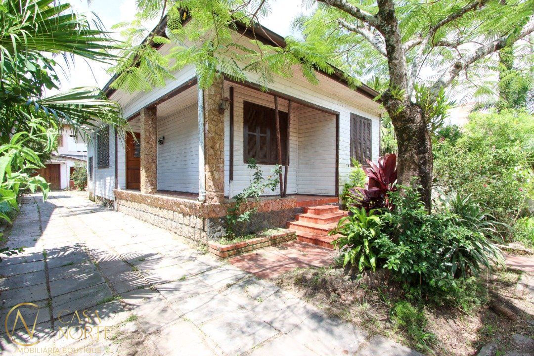 Casa à venda com 4 quartos, 167m², 3 vagas, Rua Rincão no bairro Ipanema em Porto Alegre