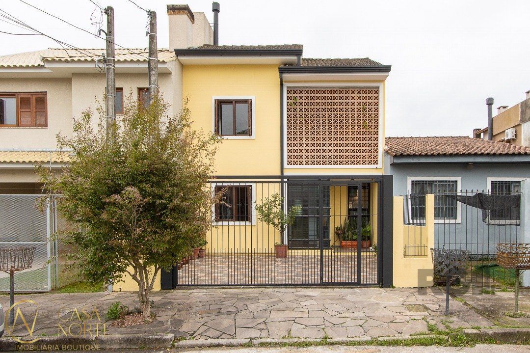 Casa à venda com 3 quartos, 111m², 1 suíte, 2 vagas, Rua Eva Pinto no bairro Hípica em Porto Alegre