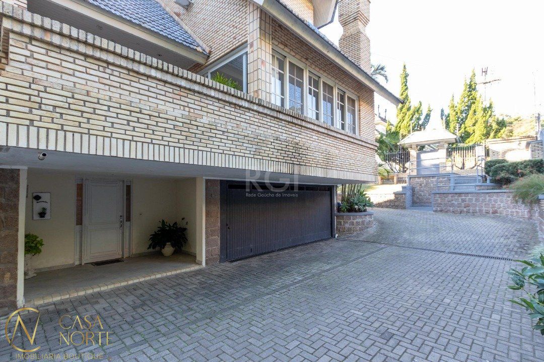 Casa de Condomínio à venda com 3 quartos, 322m², 1 suíte, 4 vagas, Rua Doutor Arnaldo da Silva Ferreira no bairro Jardim Isabel em Porto Alegre