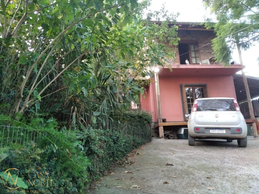 Casa à venda com 3 quartos, 130m², 1 suíte, 3 vagas, Rua Tapera no bairro Hípica em Porto Alegre