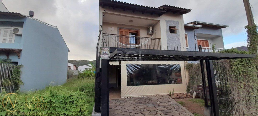 Casa à venda com 3 quartos, 172m², 1 suíte, 2 vagas, Rua Attilio Bettio no bairro Aberta dos Morros em Porto Alegre