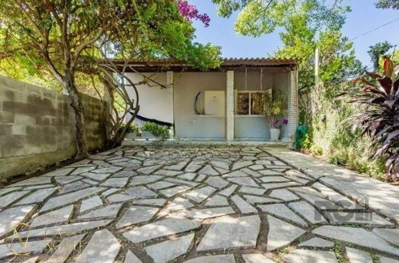 Casa à venda com 2 quartos, 109m², 2 vagas, Rua General Rondon no bairro Tristeza em Porto Alegre