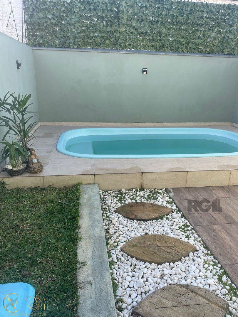 Casa à venda com 3 quartos, 176m², 1 suíte, 2 vagas, Rua Claudio da Silva Pinto no bairro Espírito Santo em Porto Alegre
