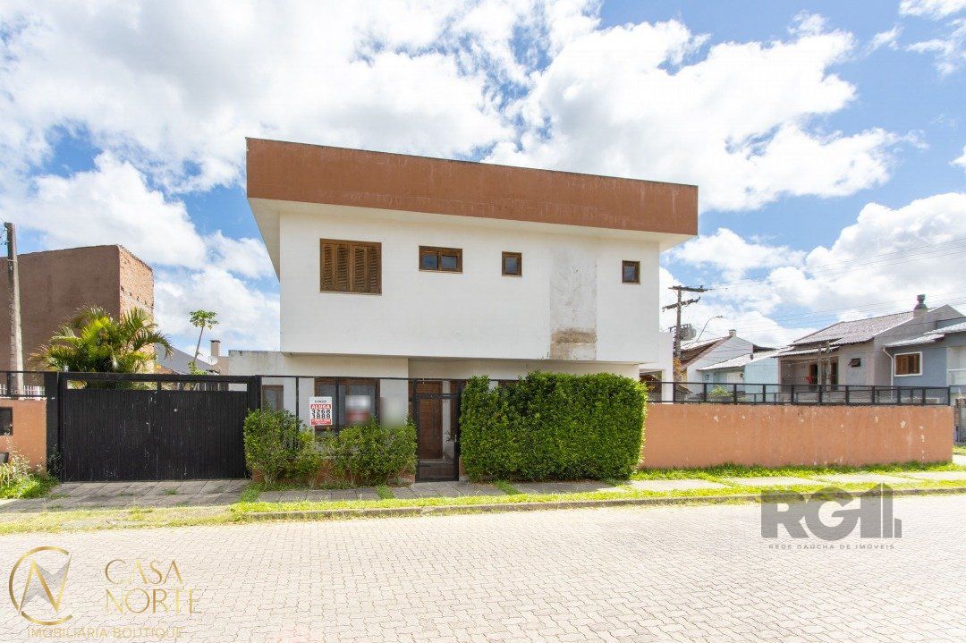 Casa à venda com 4 quartos, 140m², 1 suíte, 2 vagas, Rua Professora Doutora Hebe Tourinho no bairro Aberta dos Morros em Porto Alegre