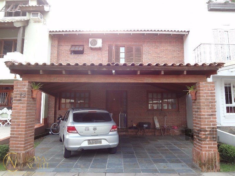 Casa de Condomínio à venda com 3 quartos, 248m², 1 suíte, 2 vagas, Avenida Juca Batista no bairro Cavalhada em Porto Alegre