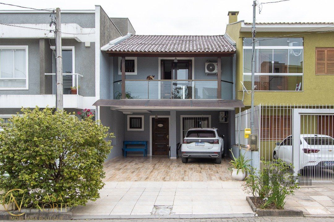 Casa à venda com 2 quartos, 111m², 2 suítes, 2 vagas, Rua Alexandre de Gusmao no bairro Hípica em Porto Alegre