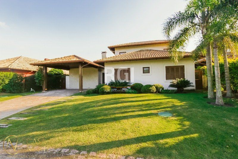 Casa de Condomínio à venda com 4 quartos, 322m², 4 suítes, 2 vagas, Avenida Juca Batista no bairro Chapéu do Sol em Porto Alegre