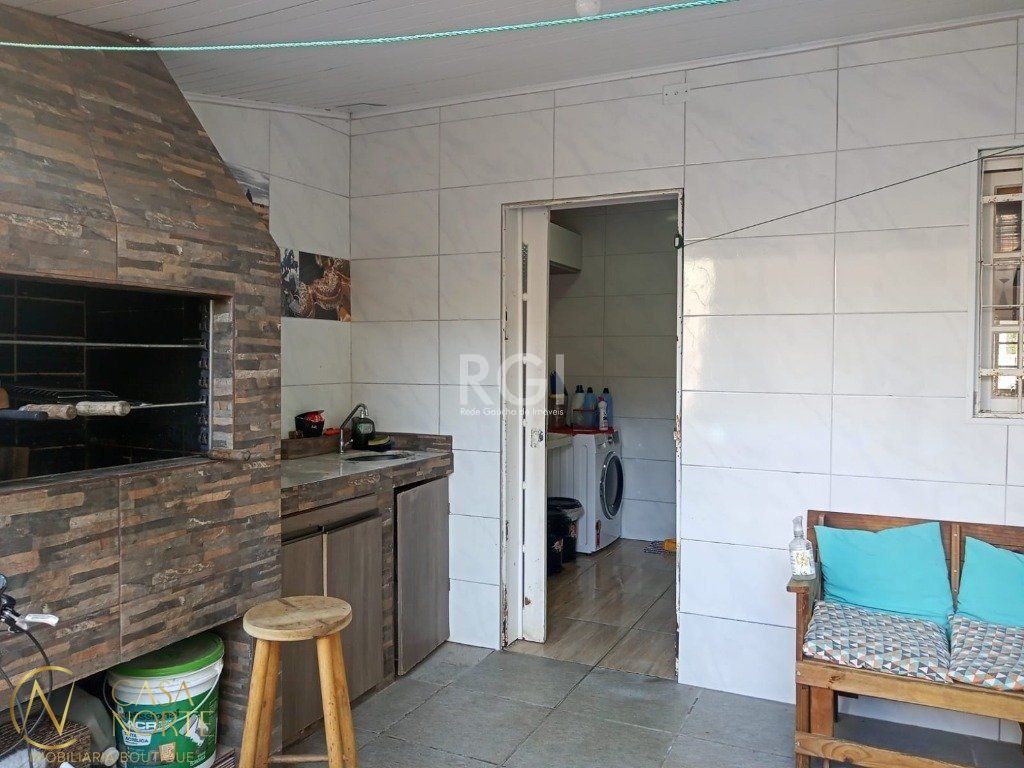 Sobrado à venda com 3 quartos, 110m², 2 vagas, Rua Eliza Tevah no bairro Aberta dos Morros em Porto Alegre