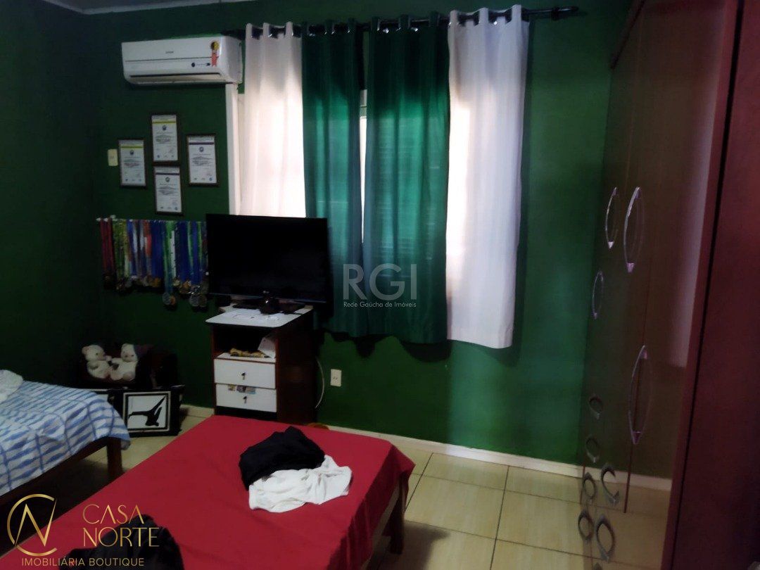 Casa à venda com 5 quartos, 450m², 1 suíte, Rua Ursa Maior no bairro Cristal em Porto Alegre