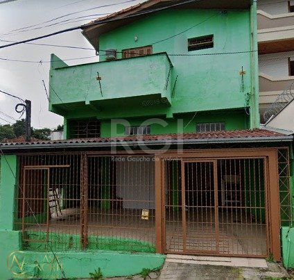 Casa à venda com 3 quartos, 360m², 1 vaga, Rua Oscar Schneider no bairro Medianeira em Porto Alegre