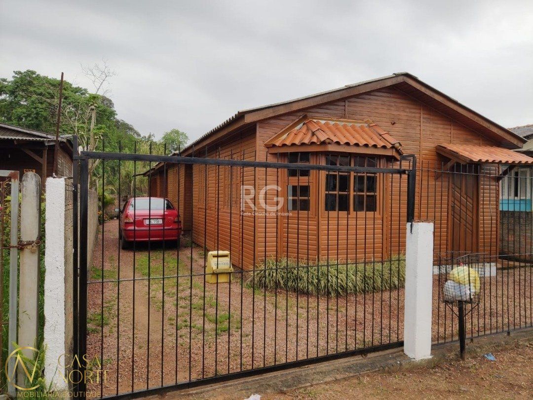 Casa à venda com 2 quartos, 43m², 3 vagas, Rua Casemiro de Souza no bairro Vila Nova em Porto Alegre
