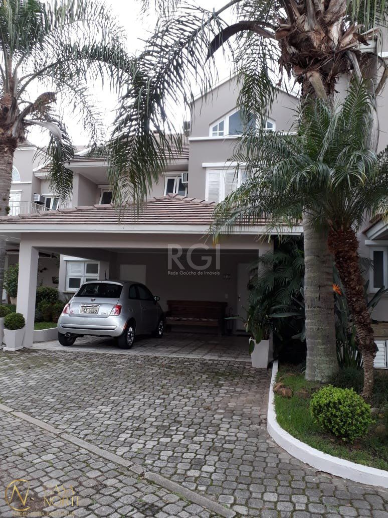 Casa de Condomínio à venda com 3 quartos, 205m², 1 suíte, 3 vagas, Avenida Coronel Marcos no bairro Pedra Redonda em Porto Alegre