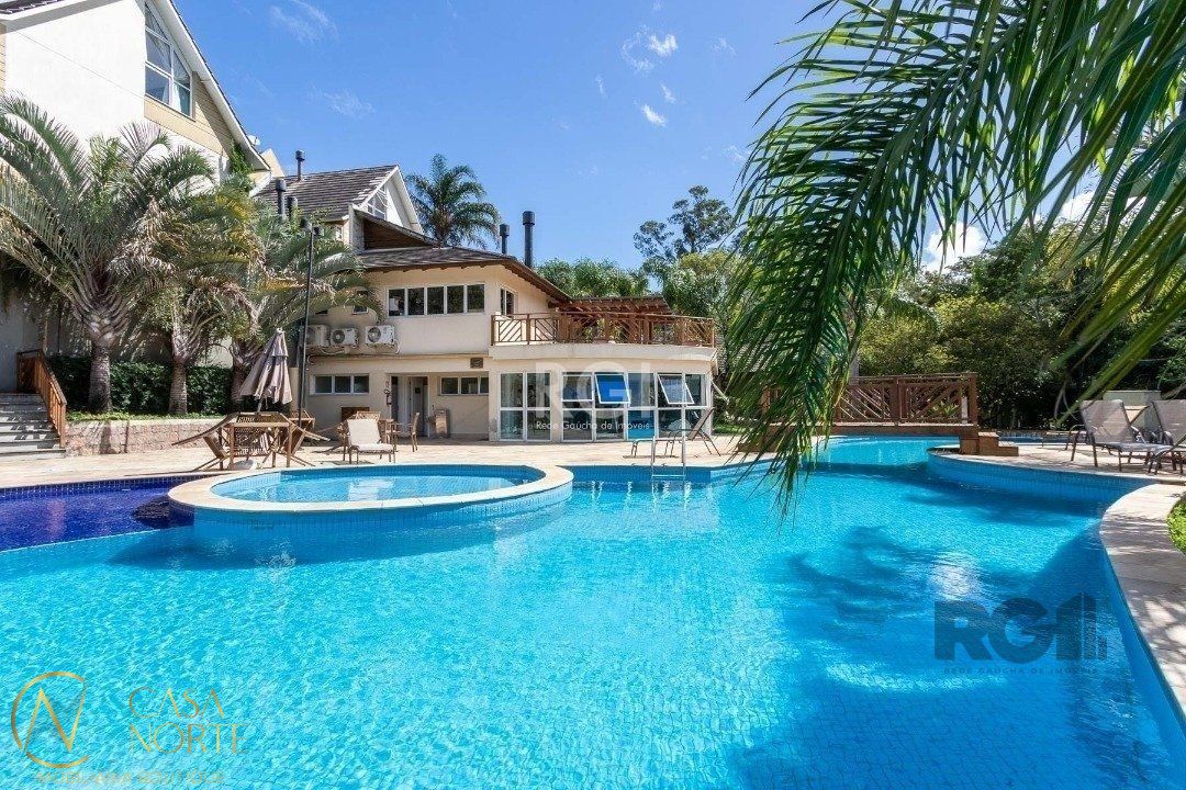 Casa de Condomínio à venda com 3 quartos, 208m², 1 suíte, 2 vagas, Avenida Engenheiro Ludolfo Boehl no bairro Teresópolis em Porto Alegre