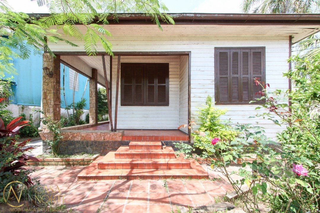 Casa à venda com 4 quartos, 167m², 3 vagas, Rua Rincão no bairro Ipanema em Porto Alegre