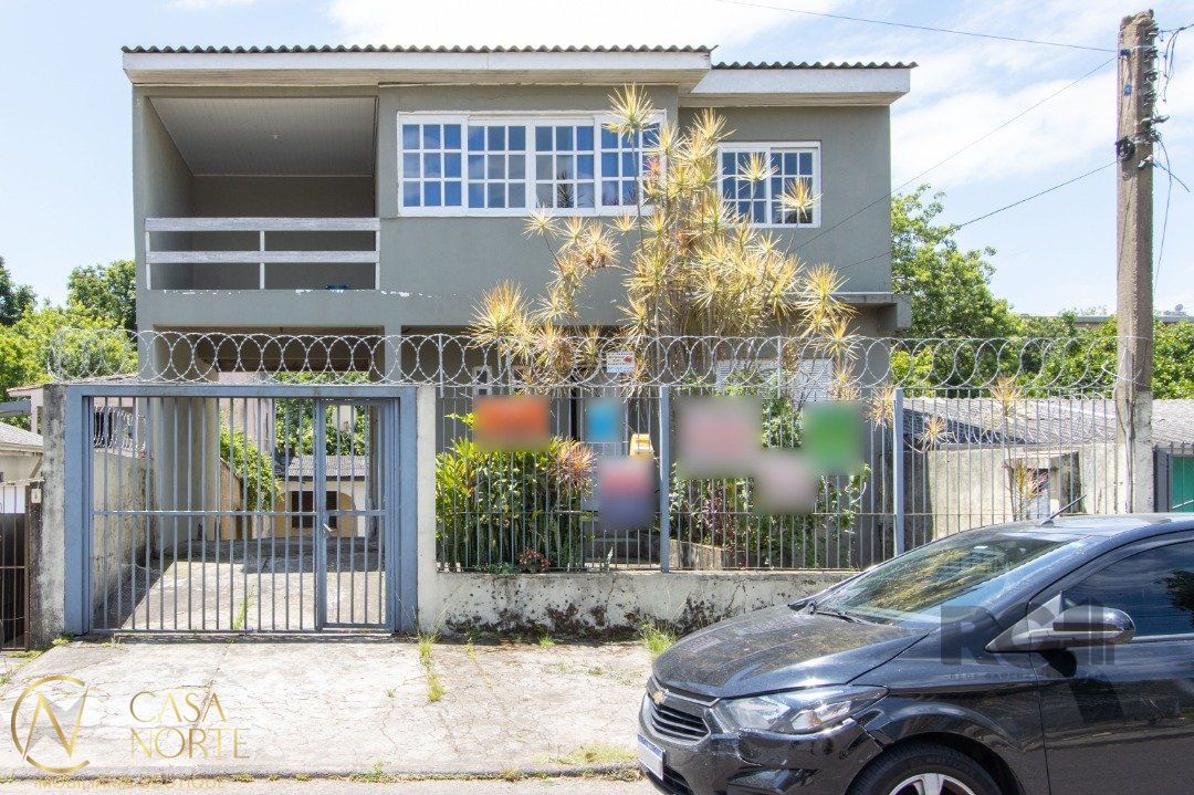 Casa à venda com 3 quartos, 346m², 3 vagas, Rua José Antônio Luísi no bairro Jardim Itu em Porto Alegre