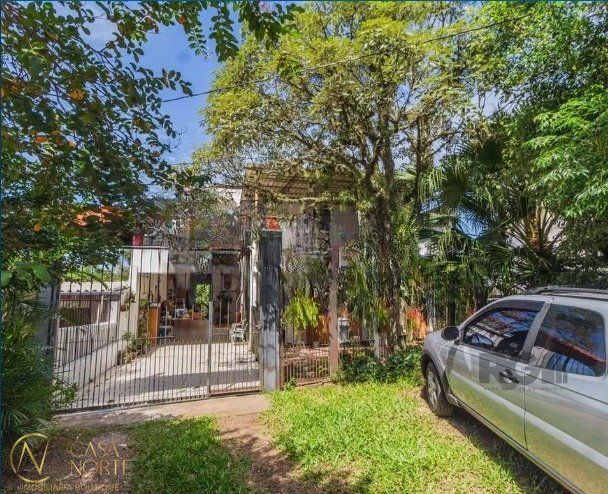 Casa à venda com 5 quartos, 274m², 1 suíte, 3 vagas, Avenida Vicente Monteggia no bairro Cavalhada em Porto Alegre