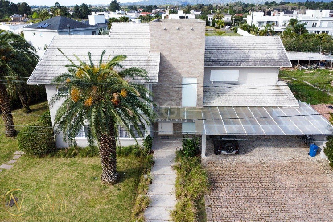 Casa de Condomínio à venda com 4 quartos, 587m², 4 suítes, 10 vagas, Avenida Juca Batista no bairro Chapéu do Sol em Porto Alegre