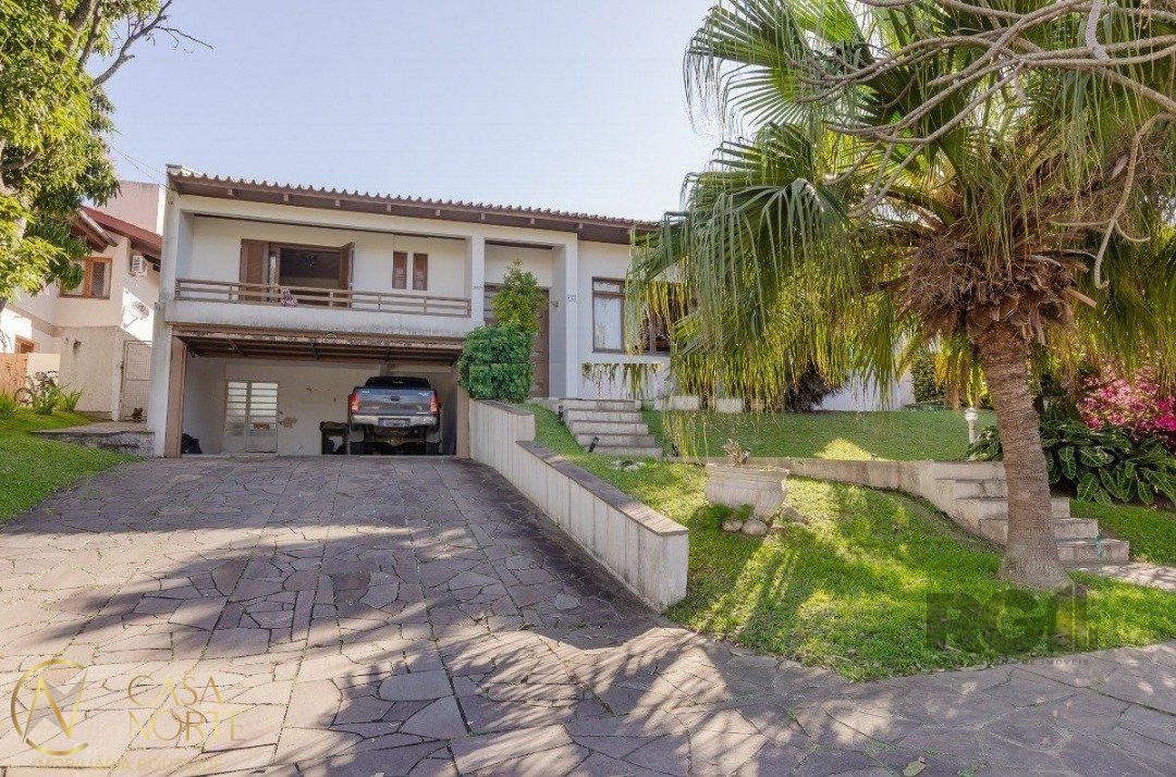 Casa de Condomínio à venda com 3 quartos, 450m², 1 suíte, 3 vagas, Avenida Firmino Octavio Bimbi no bairro Cavalhada em Porto Alegre