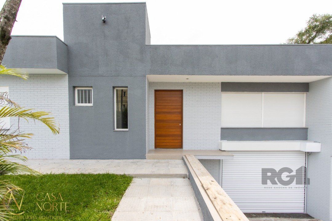 Casa à venda com 3 quartos, 260m², 2 suítes, 4 vagas, Rua Corrêa Lima no bairro Santa Tereza em Porto Alegre