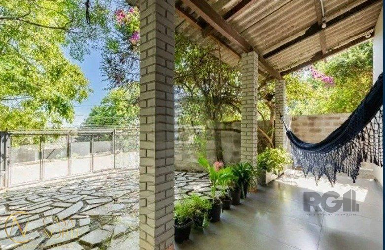 Casa à venda com 2 quartos, 109m², 2 vagas, Rua General Rondon no bairro Tristeza em Porto Alegre