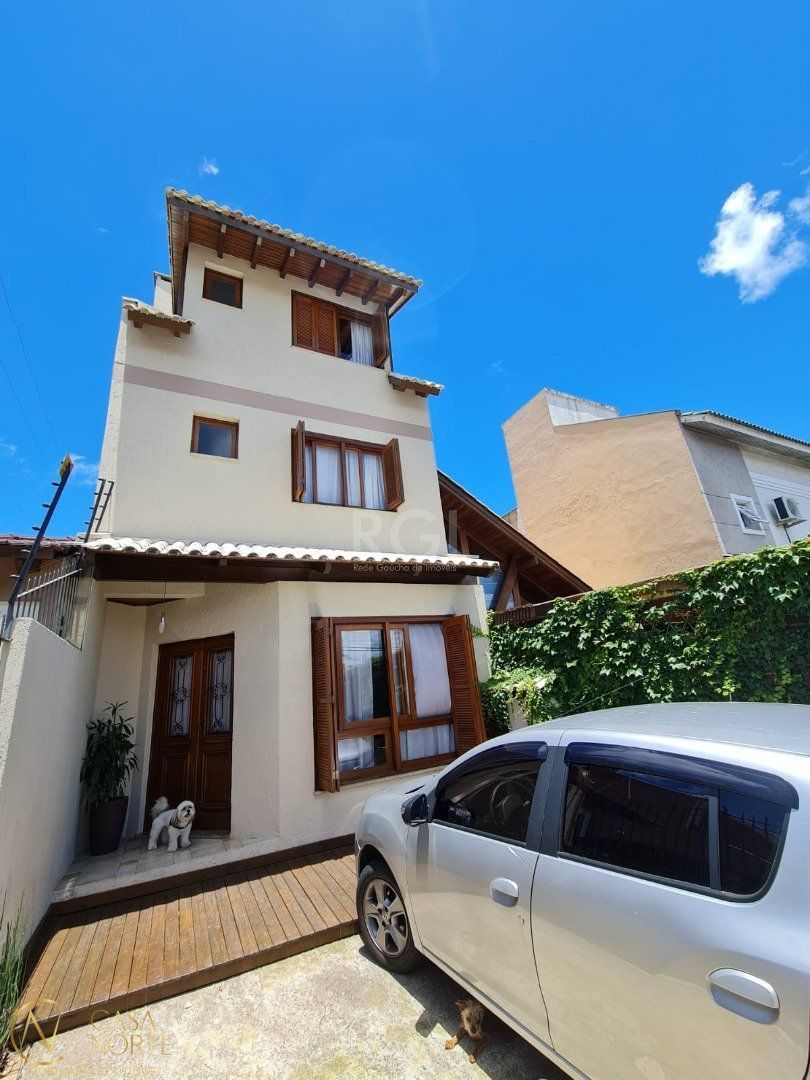 Casa à venda com 3 quartos, 182m², 3 suítes, 2 vagas, Rua Claudio da Silva Pinto no bairro Espírito Santo em Porto Alegre