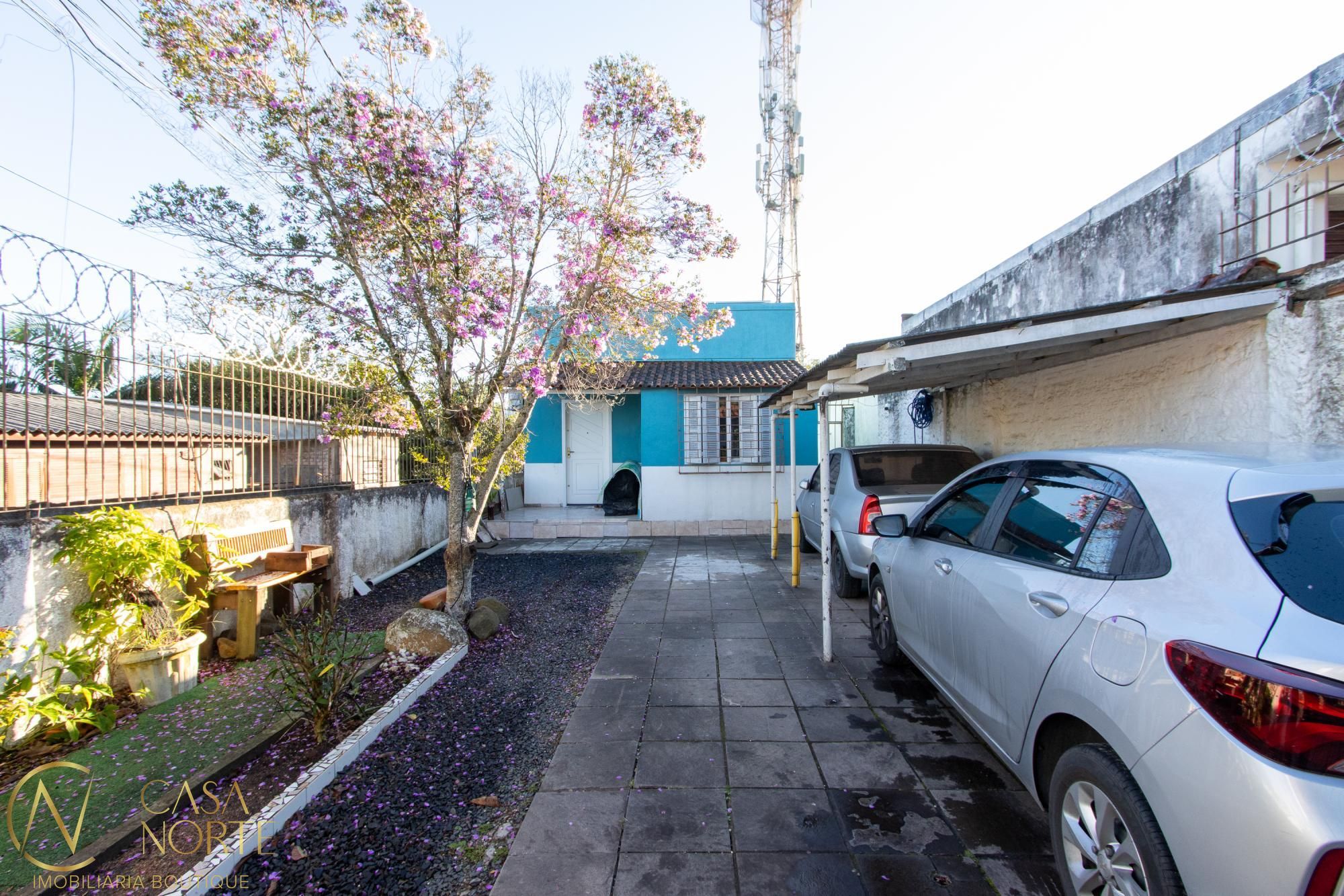 Casa à venda com 3 quartos, 134m², 5 vagas, Rua Amapa no bairro Vila Nova em Porto Alegre