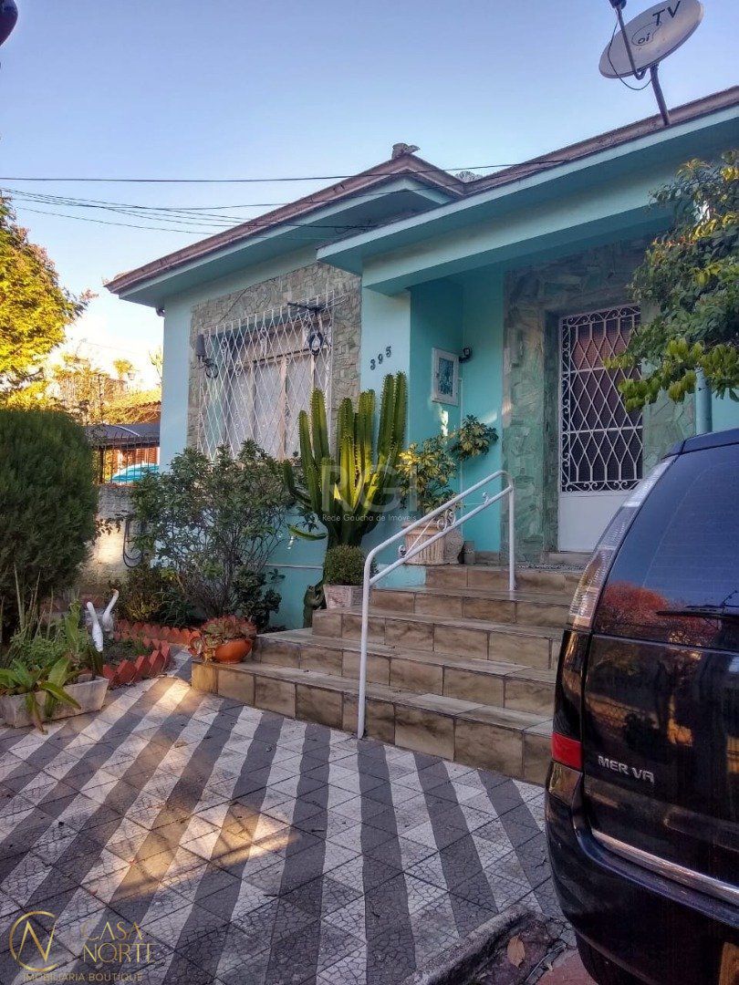 Casa à venda com 2 quartos, 165m², 4 vagas, Rua Miguel Couto no bairro Menino Deus em Porto Alegre