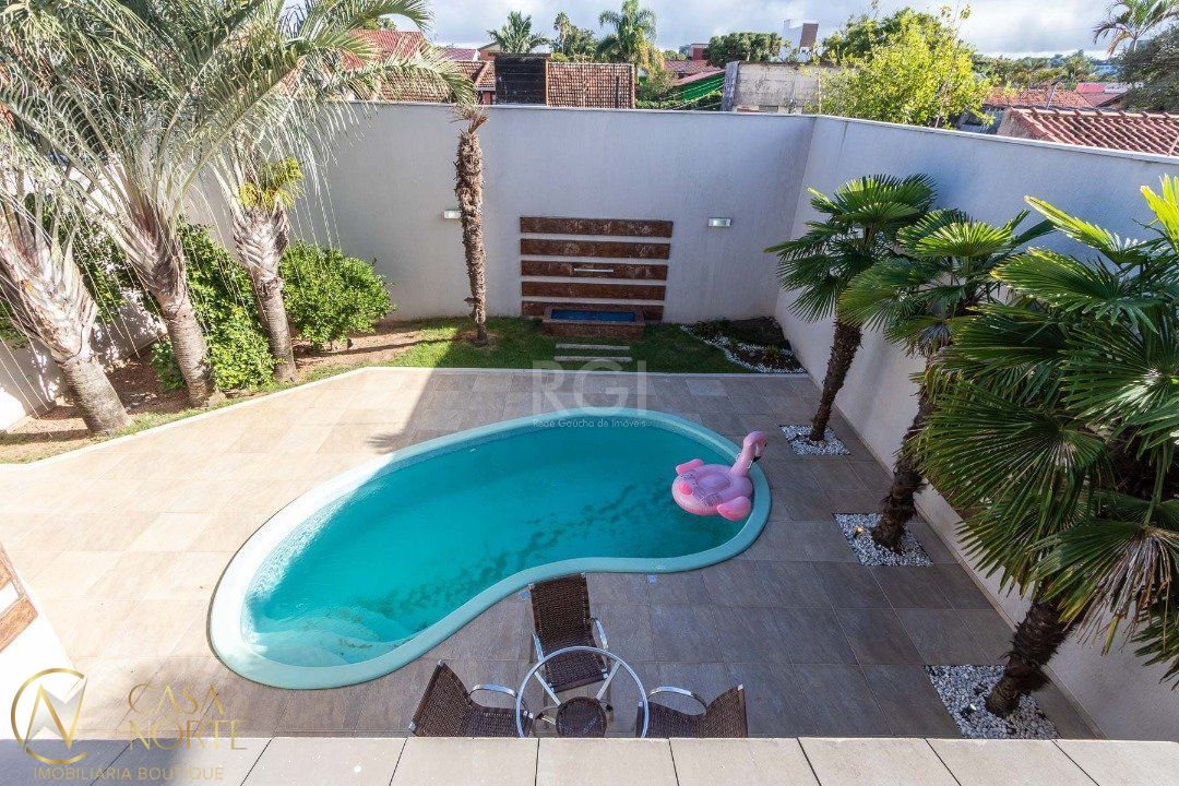 Casa à venda com 4 quartos, 463m², 4 suítes, 4 vagas, Rua Engenheiro Jorge Porto no bairro Ipanema em Porto Alegre