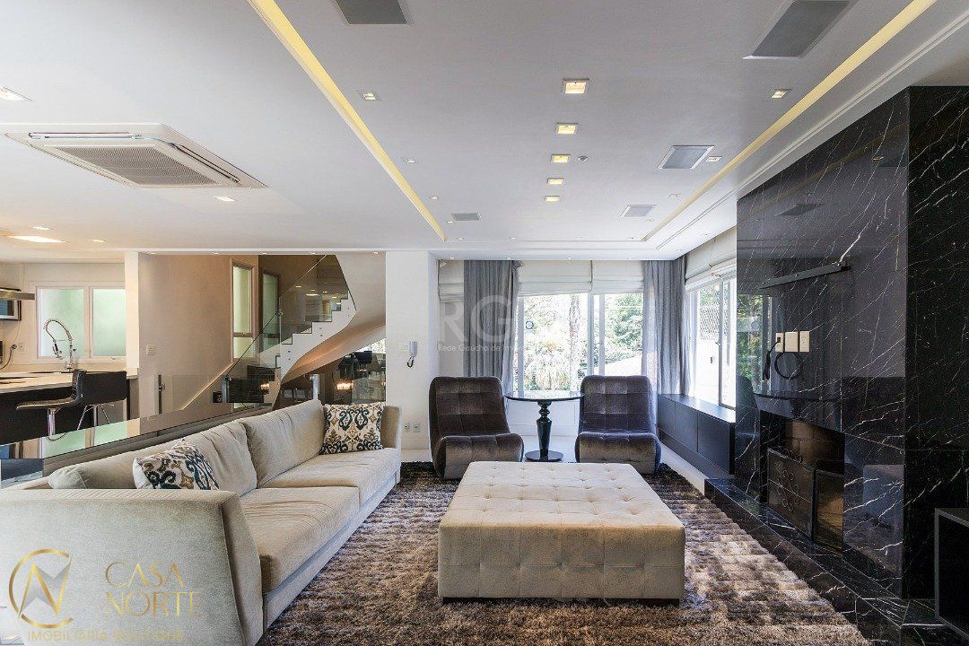 Casa de Condomínio à venda com 3 quartos, 353m², 3 suítes, 4 vagas, Avenida Coronel Marcos no bairro Pedra Redonda em Porto Alegre