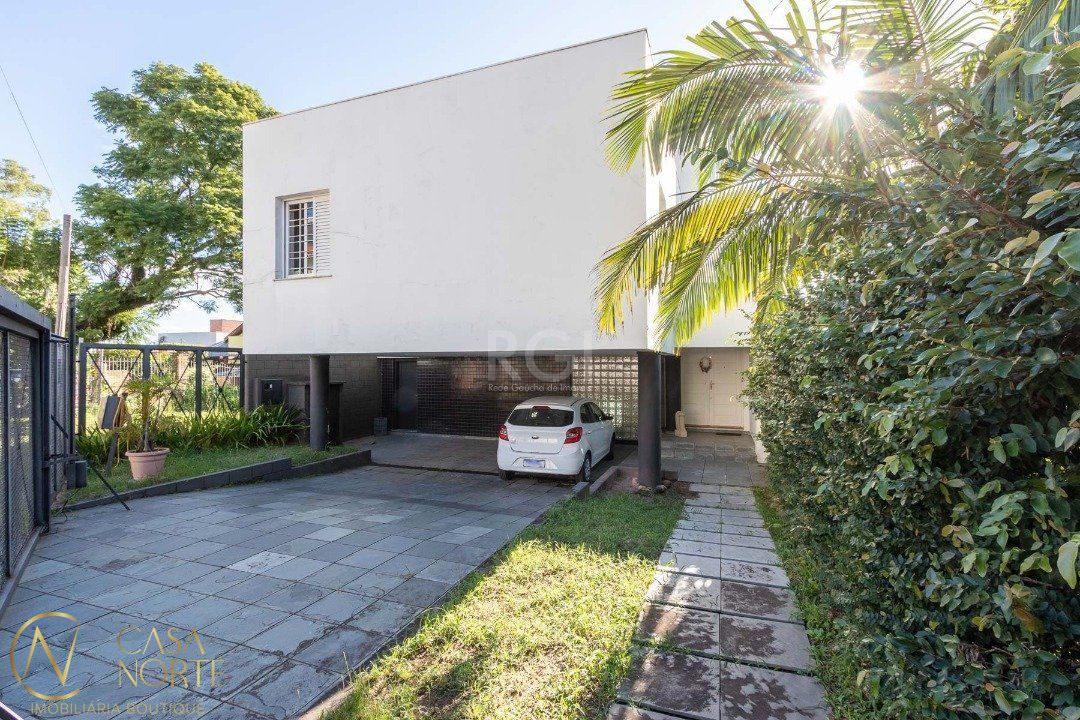Casa à venda com 3 quartos, 470m², 1 suíte, 6 vagas, Rua Alcebiades Antônio dos Santos no bairro Nonoai em Porto Alegre