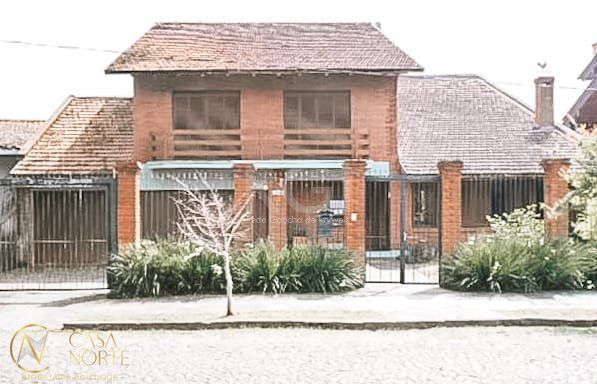 Casa à venda com 4 quartos, 404m², 1 suíte, 7 vagas, Rua Guaiana no bairro Vila Assunção em Porto Alegre
