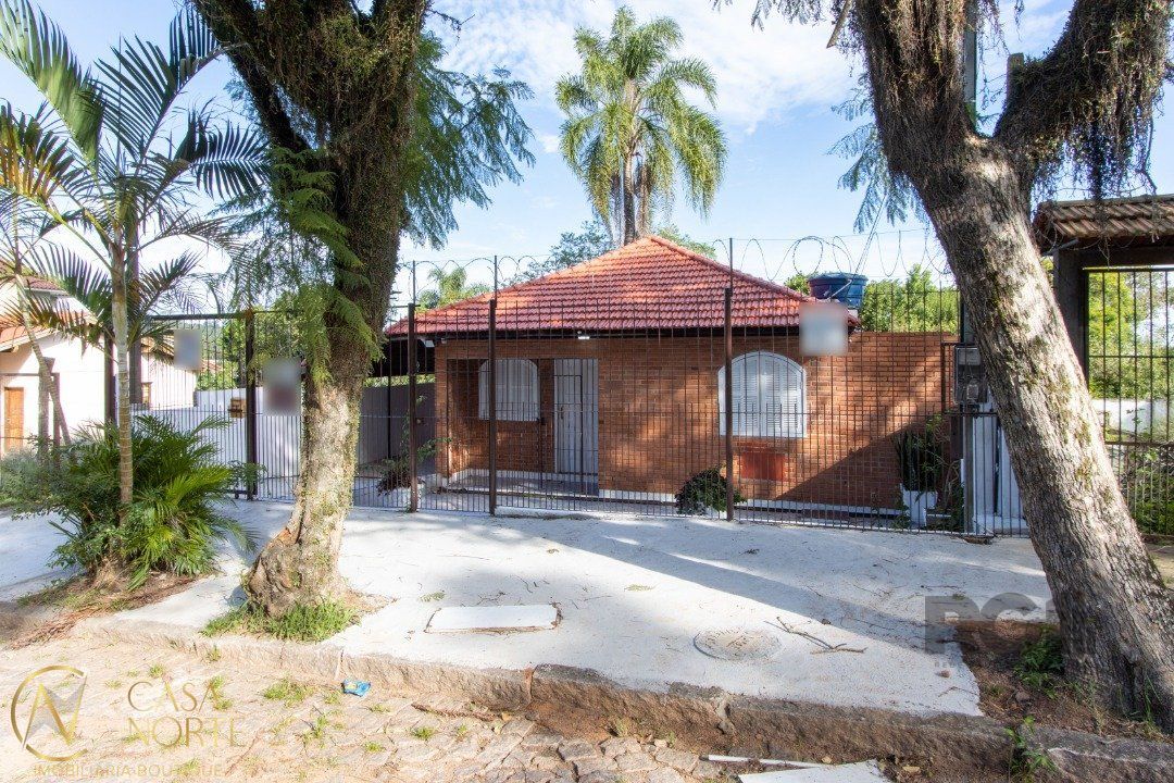 Casa à venda com 3 quartos, 186m², 2 vagas, Rua Doutor Egydio Michaelsen no bairro Cavalhada em Porto Alegre