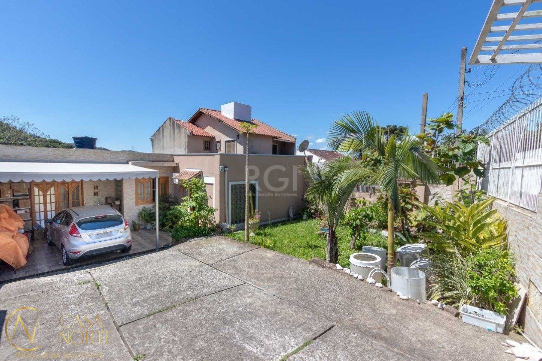 Casa à venda com 4 quartos, 370m², 1 suíte, 6 vagas, Estrada Afonso Lourenco Mariante no bairro Lomba do Pinheiro em Porto Alegre