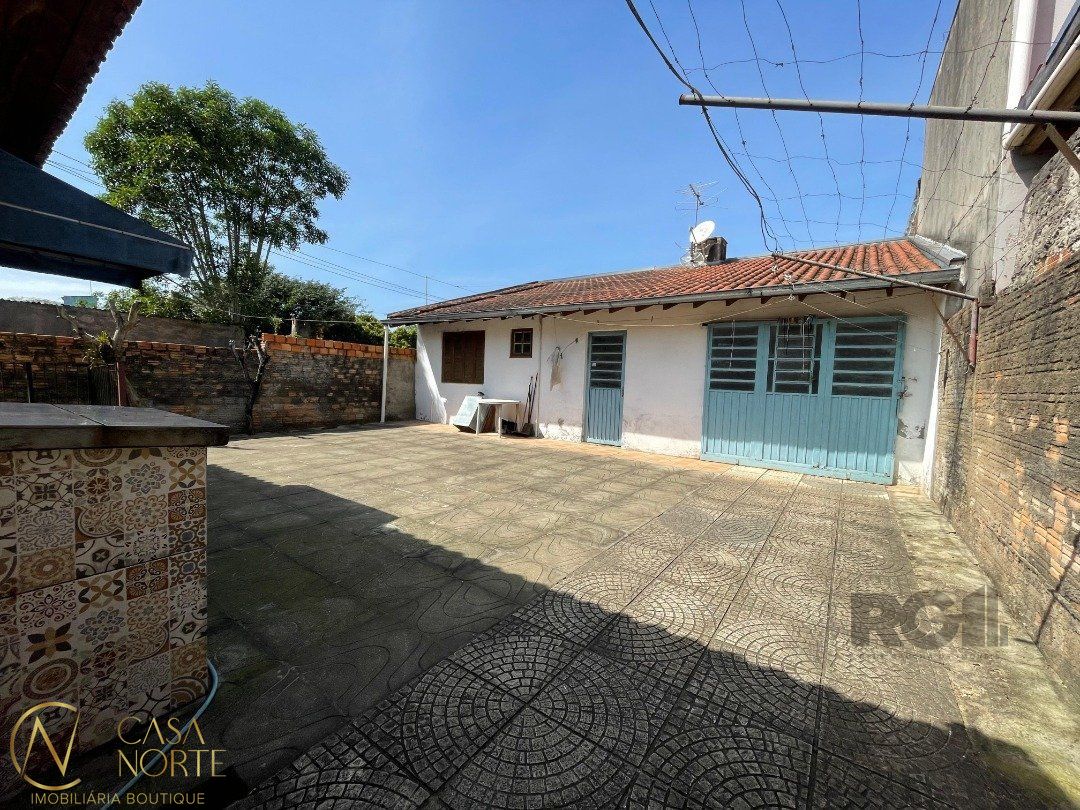 Casa à venda com 4 quartos, 116m², 1 suíte, 5 vagas, Rua Telmo Vieira de Araújo no bairro Aberta dos Morros em Porto Alegre
